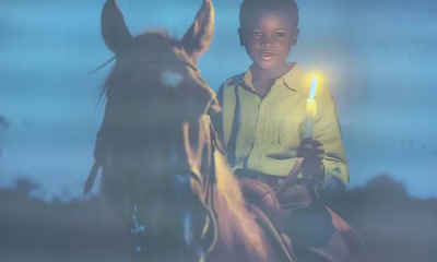 portal plural símbolo de resistência da enchente no rs ganha painel com velas e imagem do cavalo caramelo